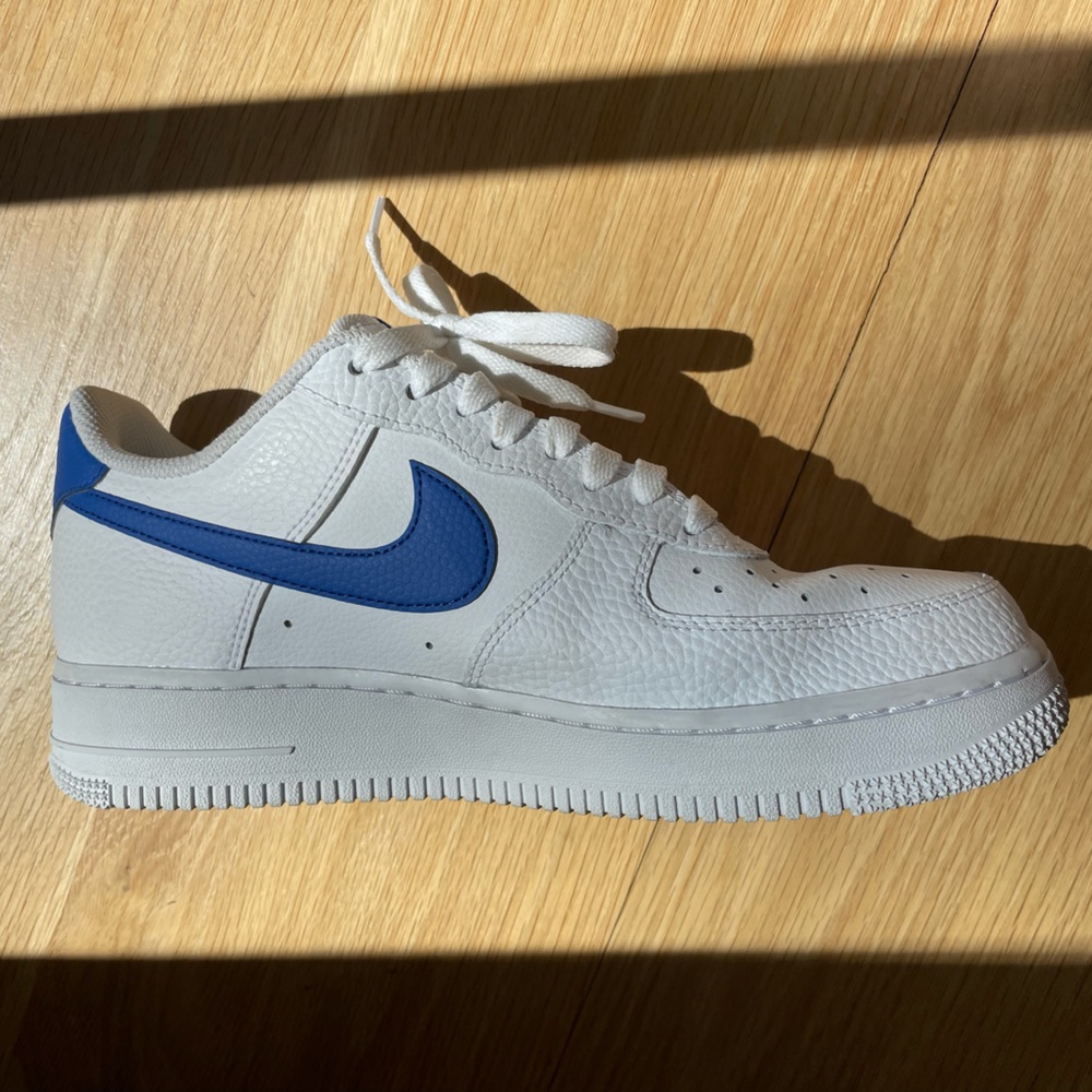 White and Blue Nike sneakers